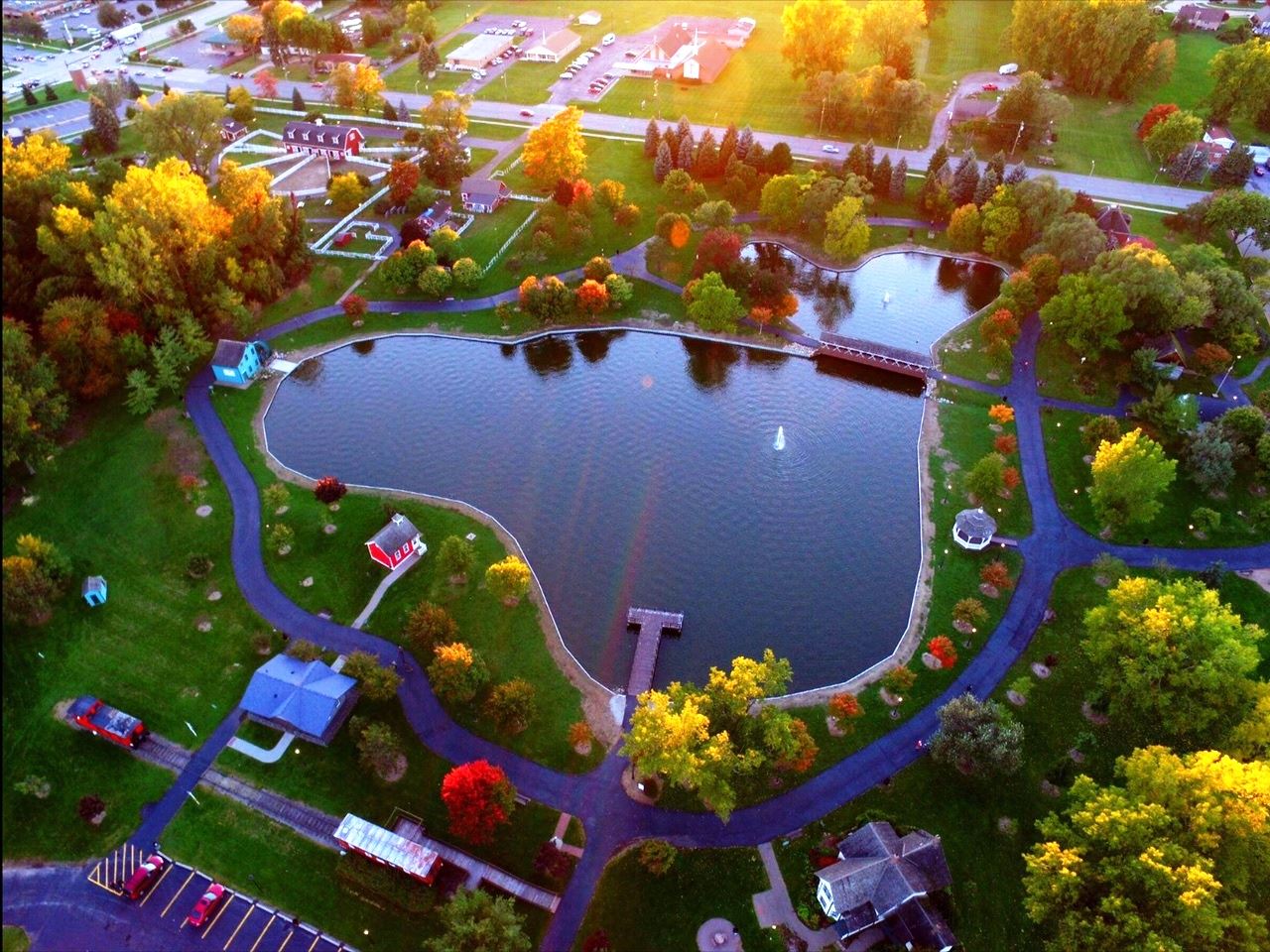 Arial overview of Coan Lake and the Historic Buildings in Heritage Park. 
