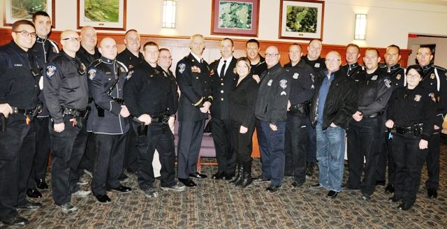Police officers in a group photo. 