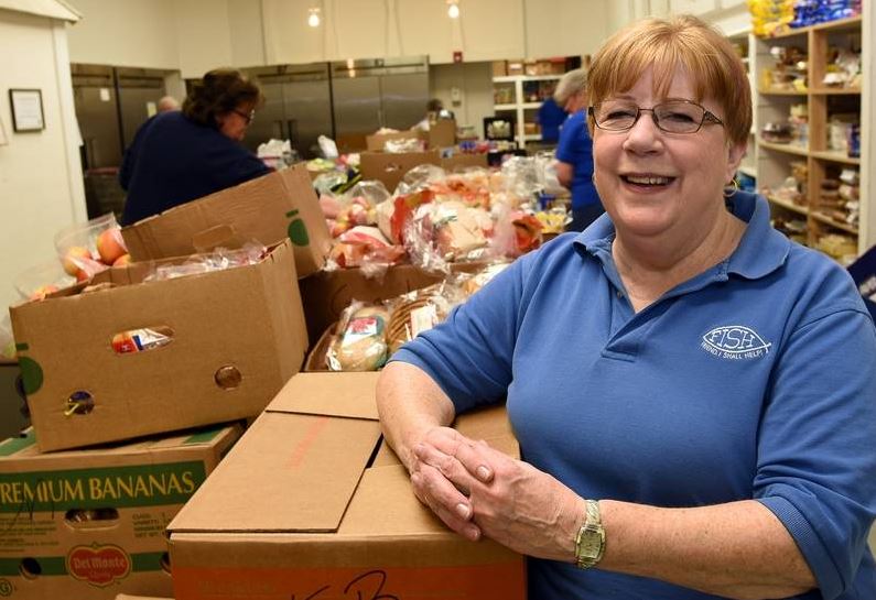 Woman working at Fish and Loaves
