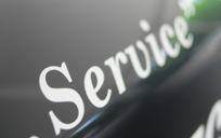 Vehicle sticker that reads, "Service." 